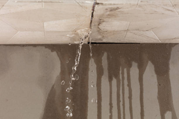 Professional Flood Damage Cleanup technician working in Calera, AL